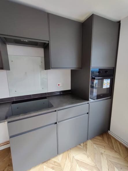 Open-plan kitchen with herringbone floor — photo 4