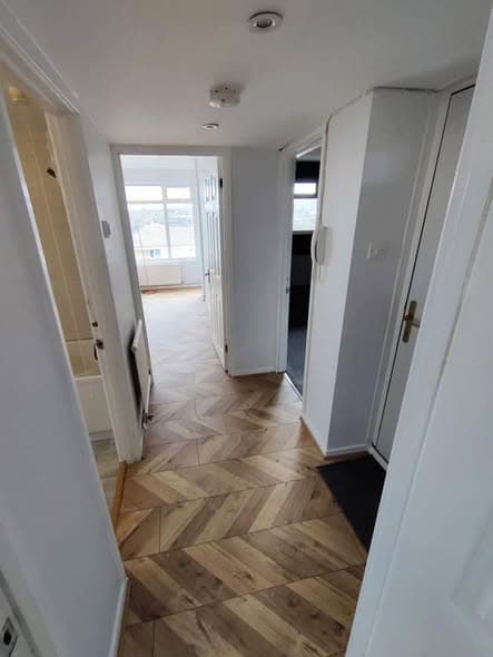 Open-plan kitchen with herringbone floor — photo 3