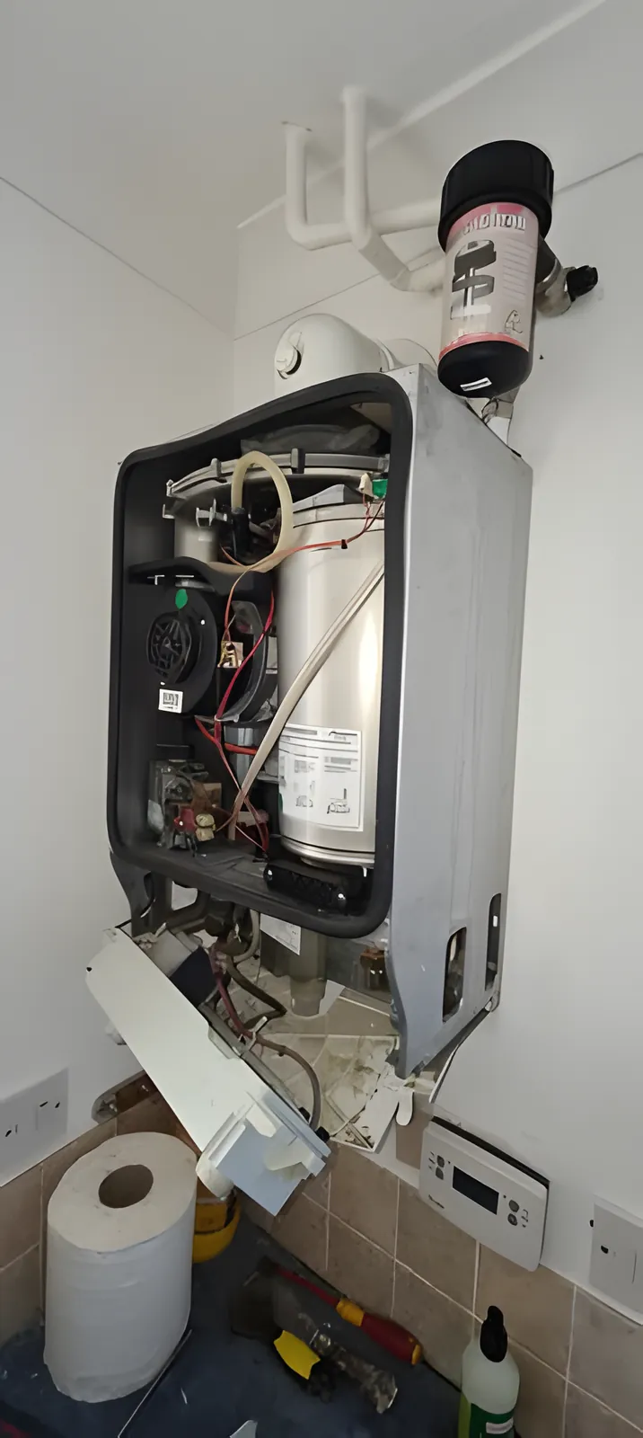 Combi boiler opened up for a service